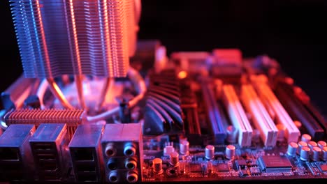 closeup-of-a-rotating-processor-CPU-fan-installed-on-the-motherboard-on-a-black-background