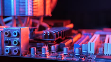 closeup-of-a-rotating-processor-CPU-fan-installed-on-the-motherboard-on-a-black-background