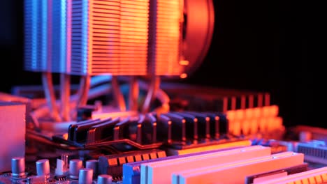 closeup-of-a-rotating-processor-CPU-fan-installed-on-the-motherboard-on-a-black-background