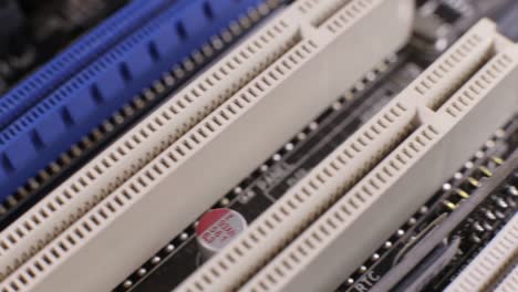 Macro-view-of-PCI-E-slots--on-the-motherboard,--slider-shoot