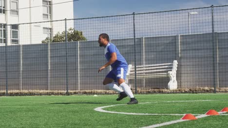 Soccer-player-training-on-field