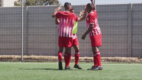 Soccer-players-celebrating-on-field