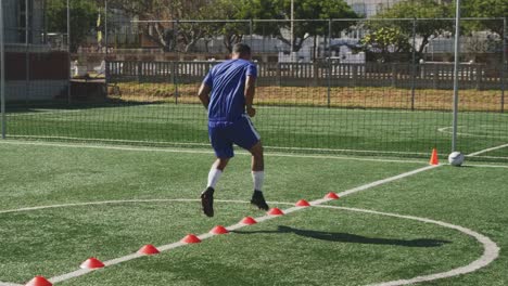 Soccer-player-training-on-field