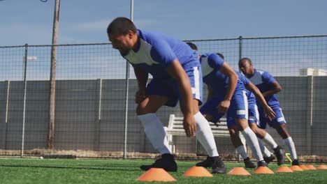 Soccer-players-training-on-field