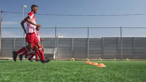 Soccer-players-training-on-field