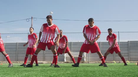 Soccer-players-stretching-on-field