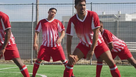 Soccer-players-stretching-on-field