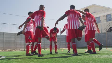 Soccer-players-stretching-on-field