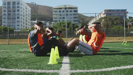 Soccer-players-training-on-field