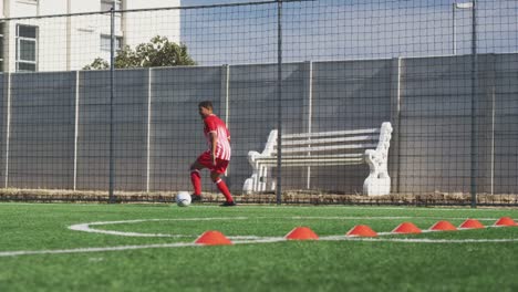 Soccer-player-training-on-field