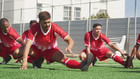 Soccer-players-stretching-on-field