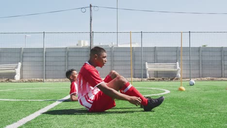 Soccer-players-training-on-field