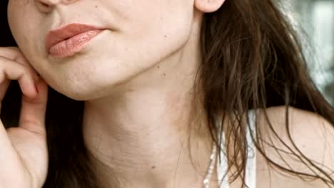 Very-closeup-shooting-of-ypung-long-haired-female-with-fresh-lips-and-shining-eyes-in-cafe