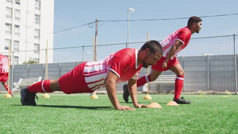 Soccer-players-training-on-field