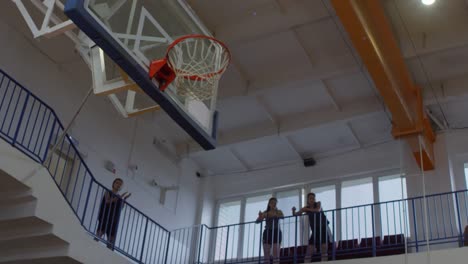 Female-Athletes-Scoring-a-Point-during-Basketball-Game