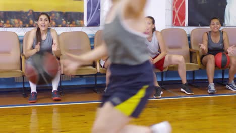 Emotional-Girls-Supporting-Basketball-Team-during-Game