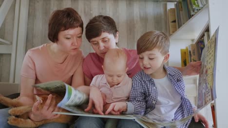 A-lesbian-family-with-two-children-and-mothers-isolated-at-home.-Home-education.