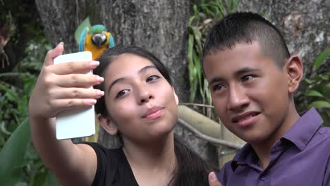 Friends-Taking-Selfie-with-Parrot