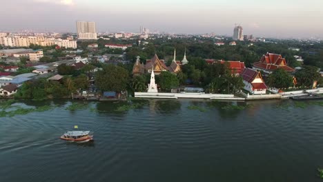 boat-in-chaopraya-river-pathumthani-outskirt-bangkok-thailand