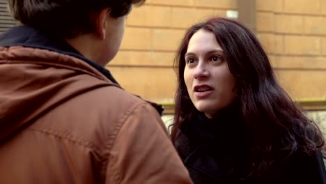 portrait-of-Angry-woman-arguing-with-her-boyfriend-in-the-street.betrayal,-anger,-break-up