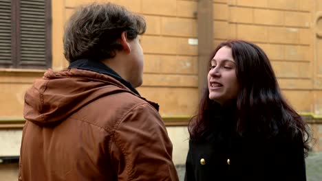 portrait-of-Furious-angry-young-woman-arguing-with-his-boyfriend-in-the-street