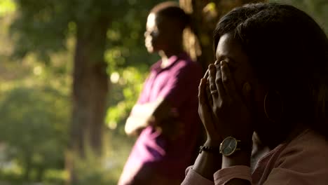 Break-up,conflict,argue.-Young-black-lovers-in-the-park-after-arguing