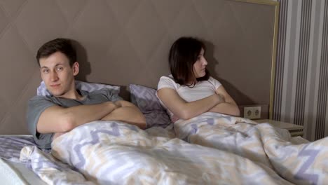 Difficulties-in-relationships.-Man-and-woman-swear-in-bed