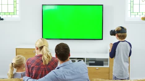 Family-Playing-Computer-Game-Using-Virtual-Reality-Headset