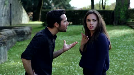 angry-boyfriend-arguing-furiously-with-his-girlfriend-in-the-park