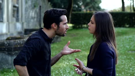 young-couple-arguing-furiously-to-the-park