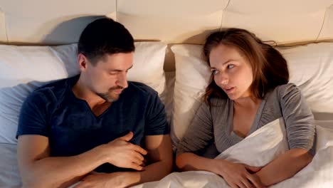 Divorce-and-separation-concept.-A-couple-in-bed-having-problems-and-crisis.