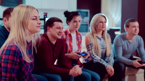 Friends-playing-video-games-in-the-flat