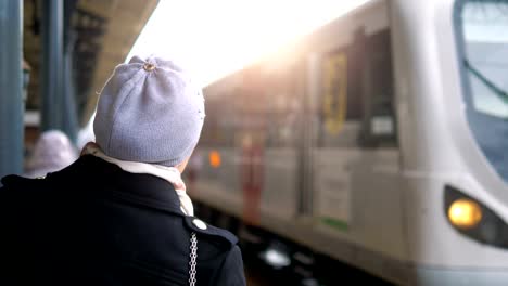 Woman-waiting-on-the-railway-station-in-4k-slow-motion-60fps