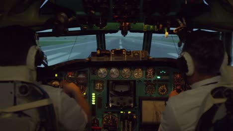 Pilots-in-Cockpit-Controlling-Airplane