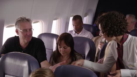 Flight-attendant-serving-drinks-and-snacks