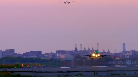 Jet-plane-taking-off-in-sunset