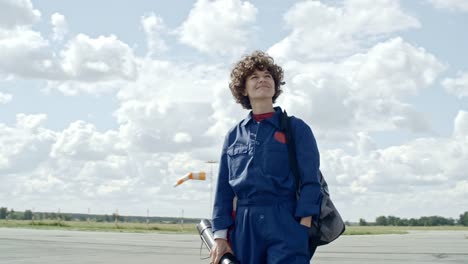 Female-Aircraft-Mechanic-Enjoying-Summer-Day