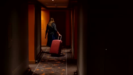 Woman-settling-in-hotel-room