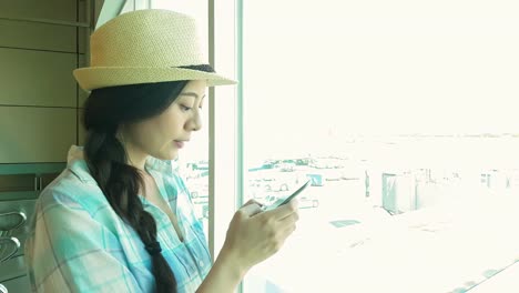 tourist-watching-at-airport-window