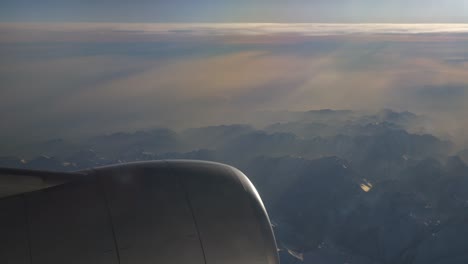 sunny-day-flying-airplane-engine-passenger-window-view-panorama-4k-china