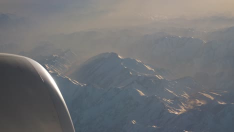 sun-light-airplane-engine-mountains-window-view-4k-china