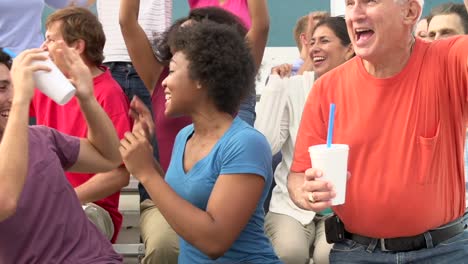 Spectators-Cheering-At-Outdoor-Sports-Event-In-Slow-Motion