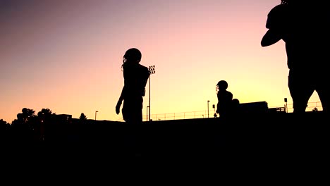 Silhouetted-Football-Players