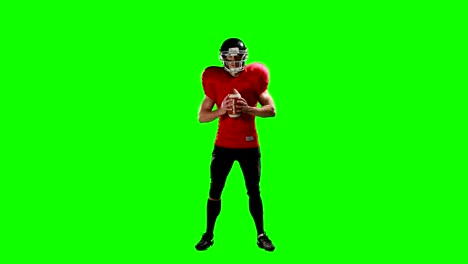 American-football-player-holding-ball