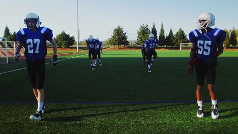 Football-players-warming-up-before-a-game