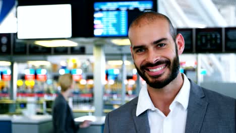 Businessman-looking-at-his-passport