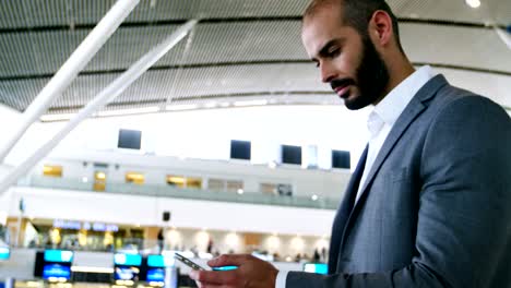 Businessman-using-a-smartphone