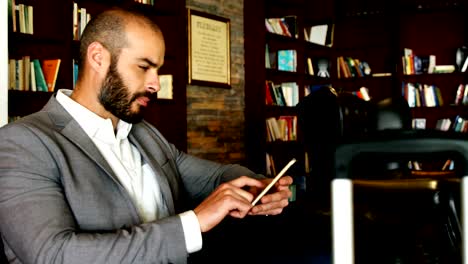 Businessman-using-a-smartphone