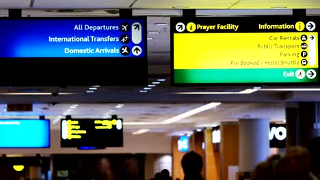 Directional-signs-at-airport-terminal