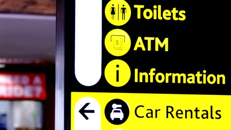 Directional-signs-at-airport-terminal